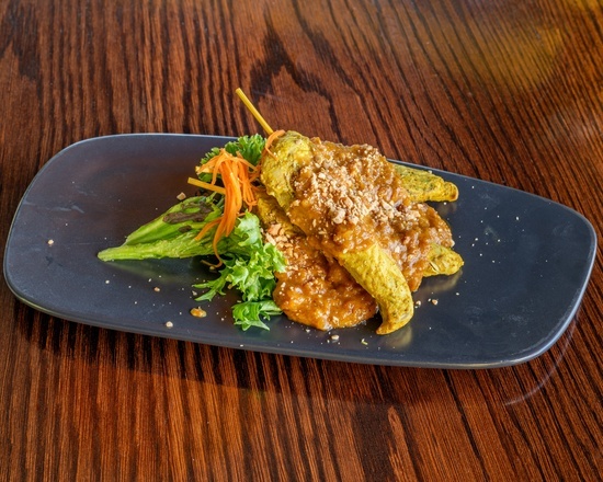 Satay chicken skewers