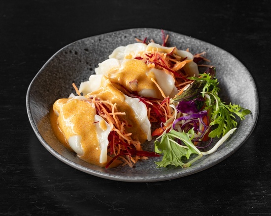 SHANGHAI DUMPLING WITH PANANG CURRY SAUCE